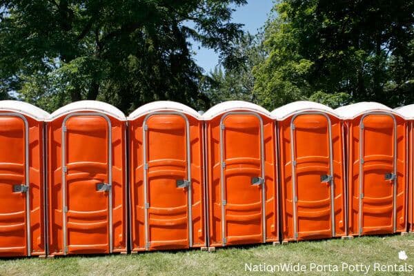 a lineup of clean and well-maintained portable loos for workers in Humboldt, SD