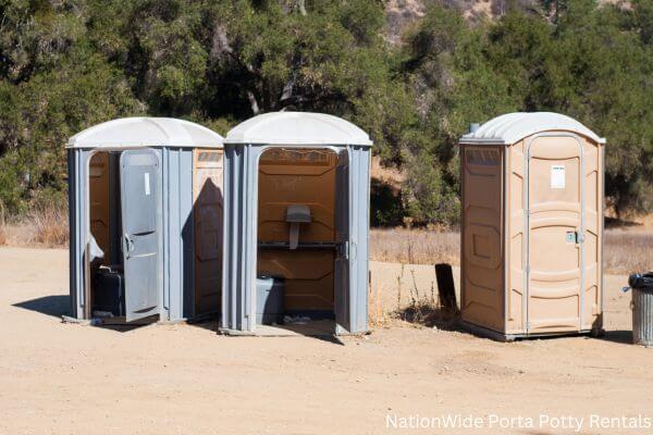 a clean row of portable restrooms for outdoor weddings or festivals in South Dakota